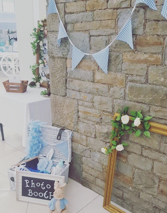 Peter Rabbit baby shower - themed photo booth with blue and white photo props